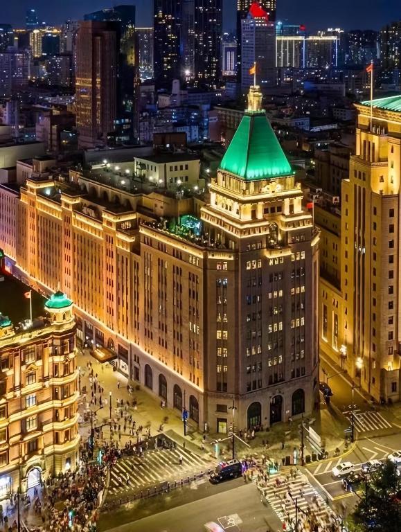 Người đàn ông bí ẩn trong bộ dạng giản dị tại triển lãm ô tô: Ai là chủ nhân của Fairmont Peace Hotel?- Ảnh 5.